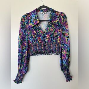 Multicolor floral long sleeve blouse.